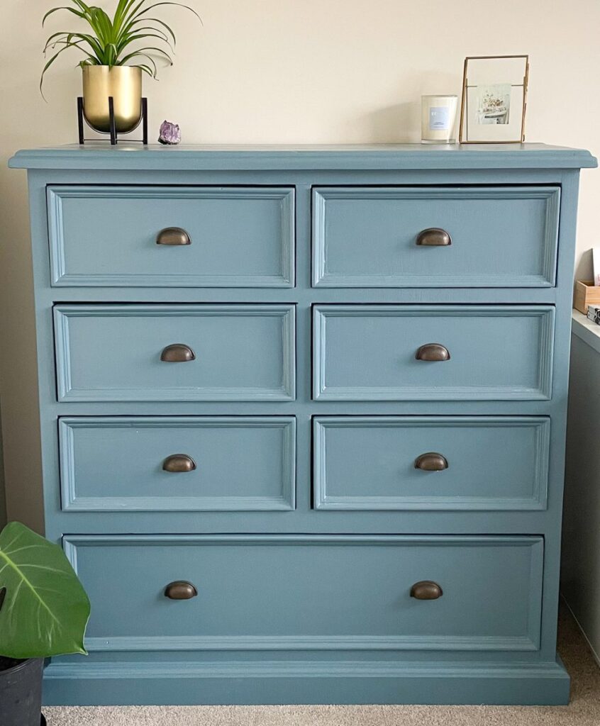 Finished painted dressers in rich blue with brass fixtures