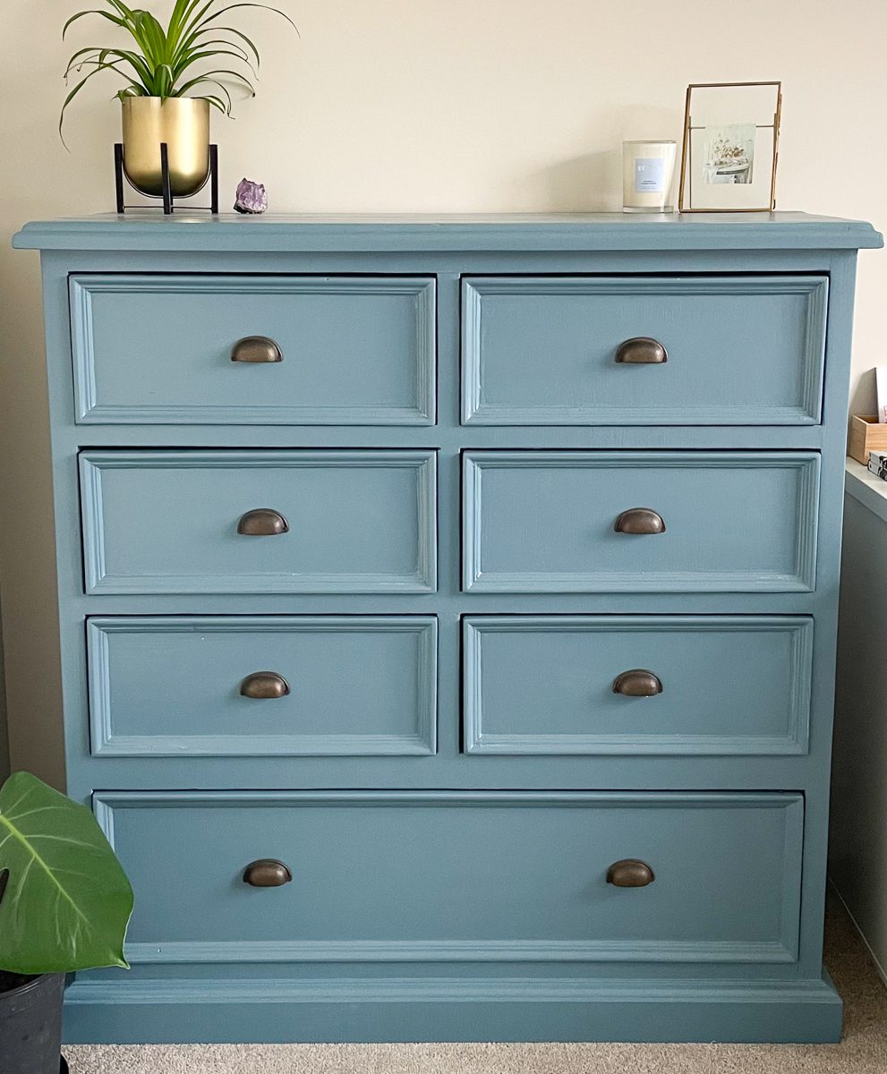 Before and after images of dresser that was painted a rich blue colour