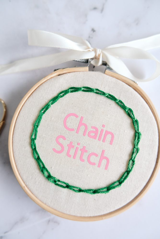 Close up of chain stitch on an embroidery hoop