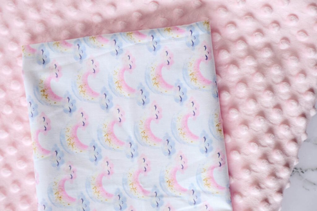 Baby pink mink fabric and white cotton with pastel rainbow print