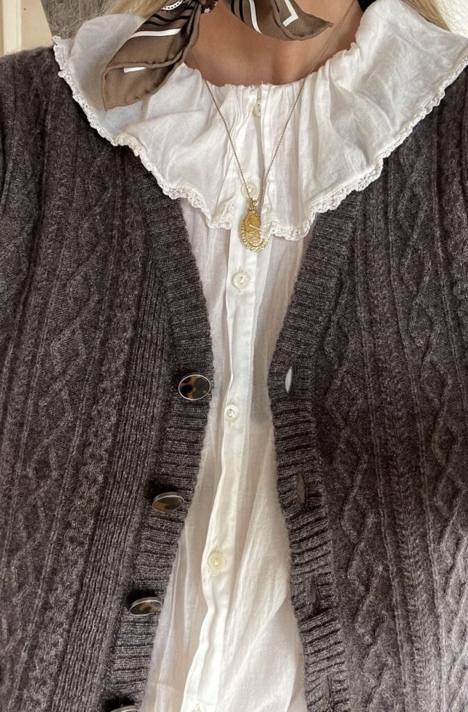 Knitted cardigan and cotton blouse