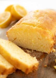 Lemon loaf sliced on chopping board