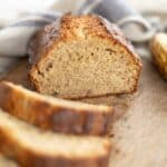Close-up of moist banana bread texture showing banana speckles