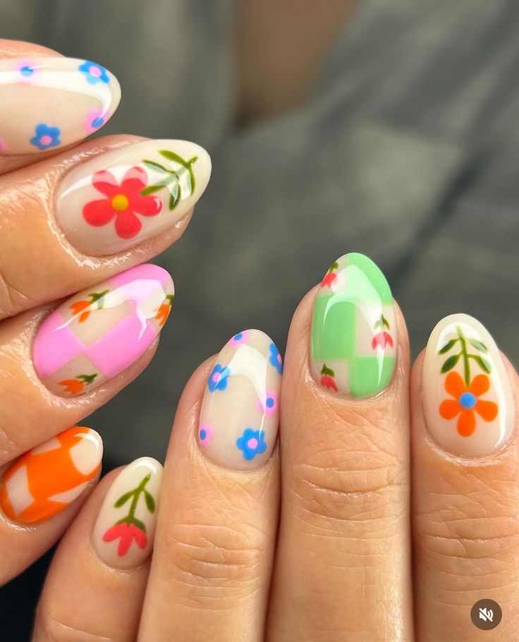 Bright colourful spring nails with floral art and checkerboard patterns