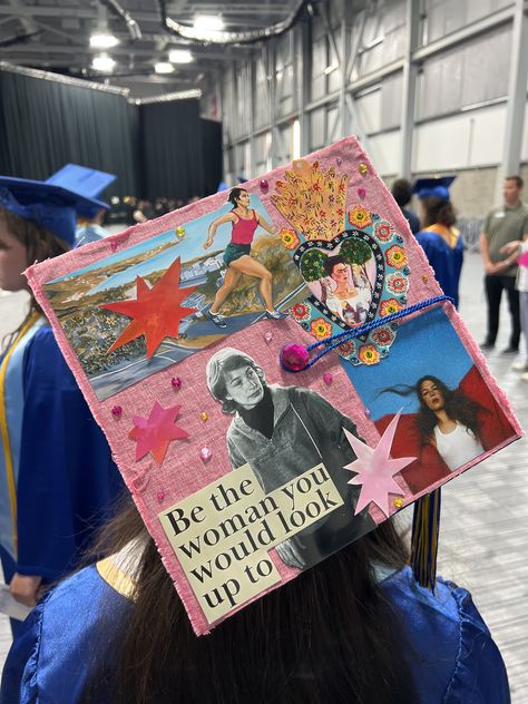 Pink graduation cap styled as a collage with magazine cutouts, photo prints, red star shapes, gem stones, and a printed quote reading be the woman you would look up to.