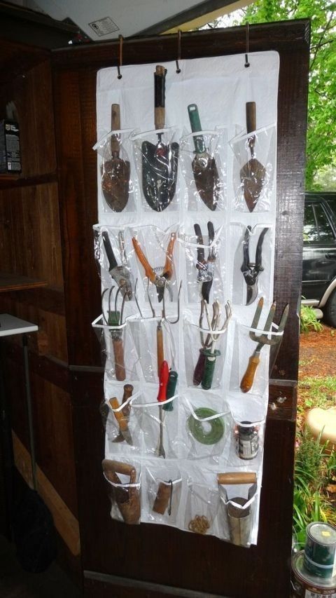 Hanging shoe organizer used to store small garden hand tools