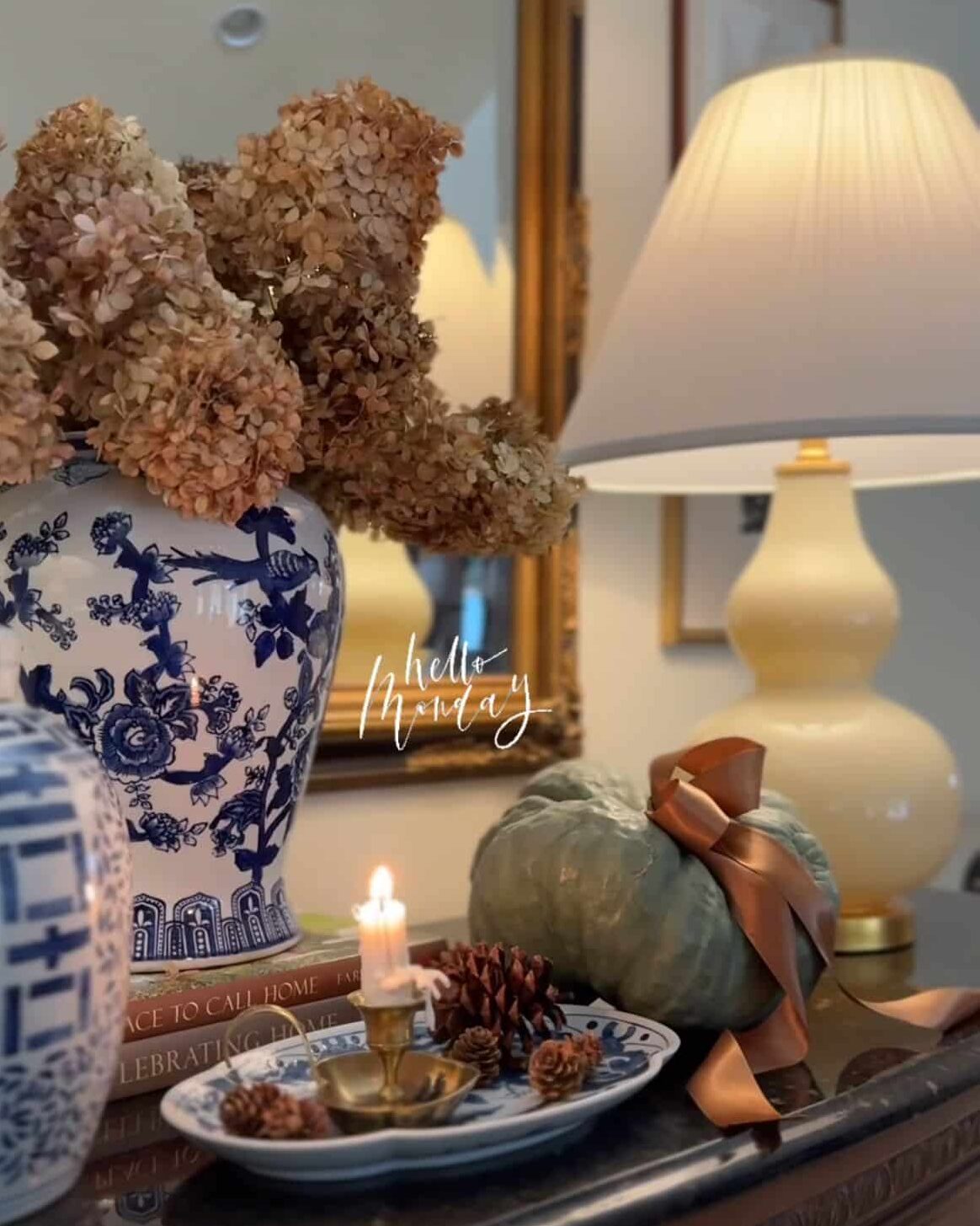 Blue and white ginger jars styled with a velvet pumpkin and dried hydrangeas