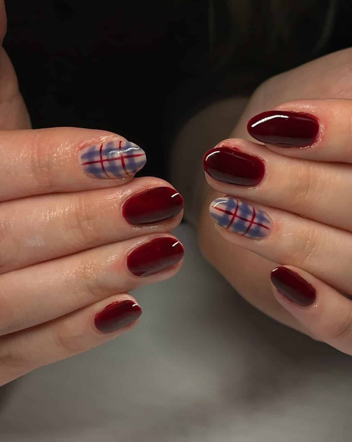 Cherry red autumn nails with blue plaid accent nails