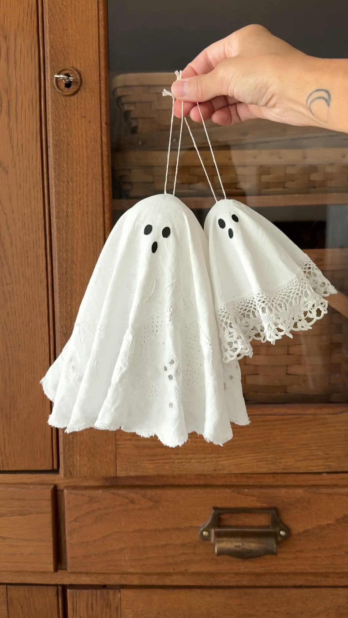Hanging ghosts made from stiffened vintage linen and lace handkerchiefs