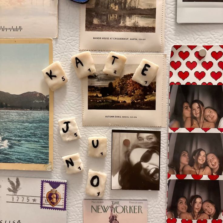 Clay Scrabble tile magnets spelling names on a fridge covered with photos, postcards and stamps