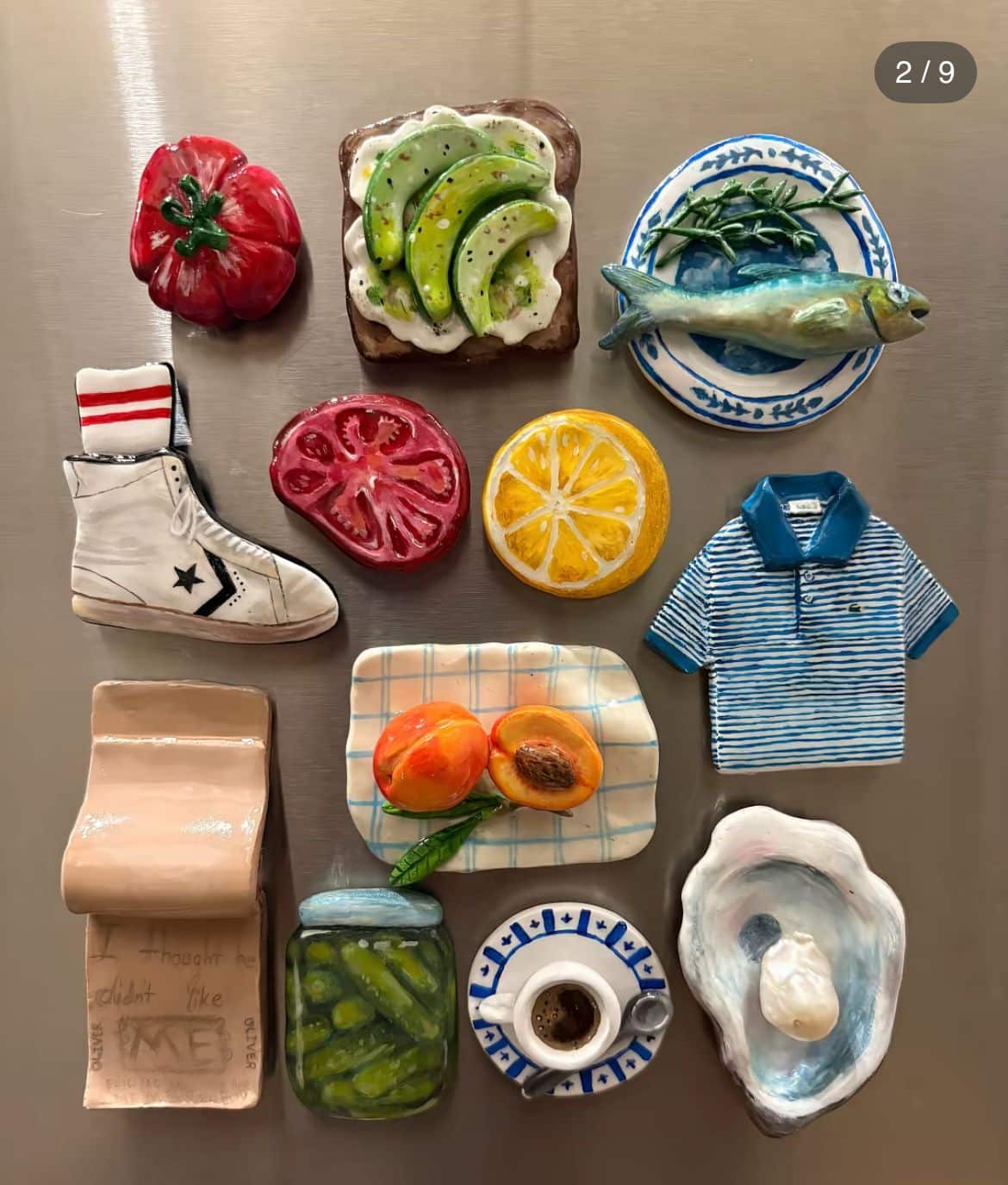 Highly detailed clay magnets including a striped polo shirt, a high-top sneaker, tomatoes, peaches and avocado toast
