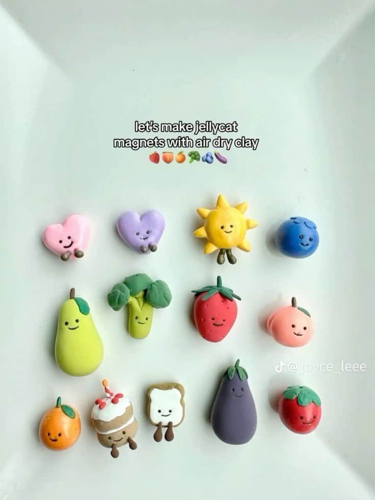 Jellycat-inspired clay magnets shaped like smiling fruit and vegetables with little faces and legs