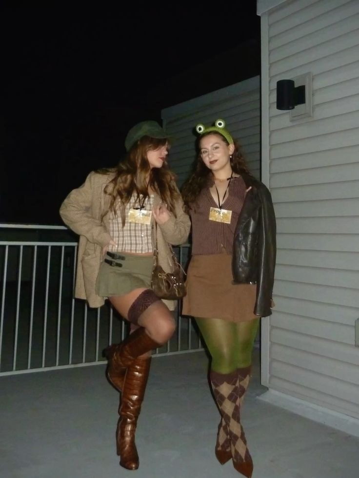Two friends dressed as Frog and Toad, one in tweed and plaid, the other in a green frog headband and green tights