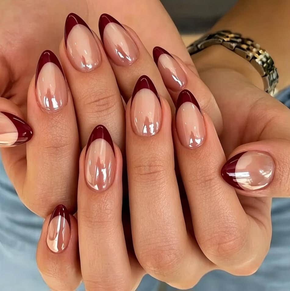 Long almond Christmas nails with oxblood French tips