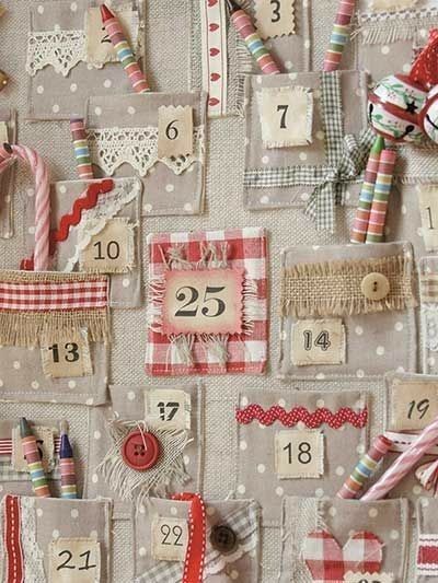 Linen advent calendar pockets trimmed with lace, ric rac, burlap and buttons with paper number tags