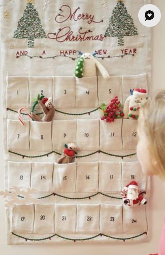 Embroidered Merry Christmas linen pocket advent calendar with stitched trees and numbers