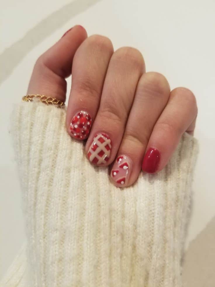 Short cherry pie nails with red lattice, cherries and white dot details
